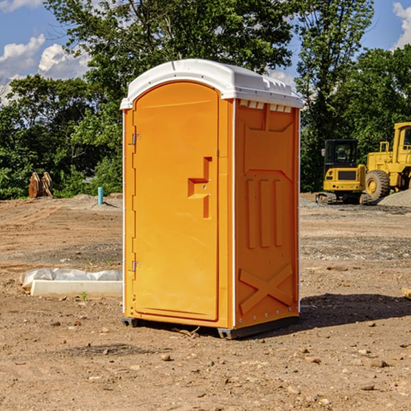 how often are the porta potties cleaned and serviced during a rental period in McMullin